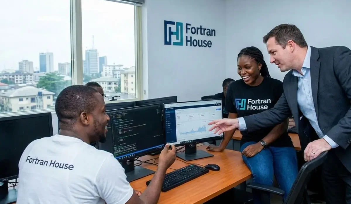 Fortran House building a software for a business in Lagos, in their office