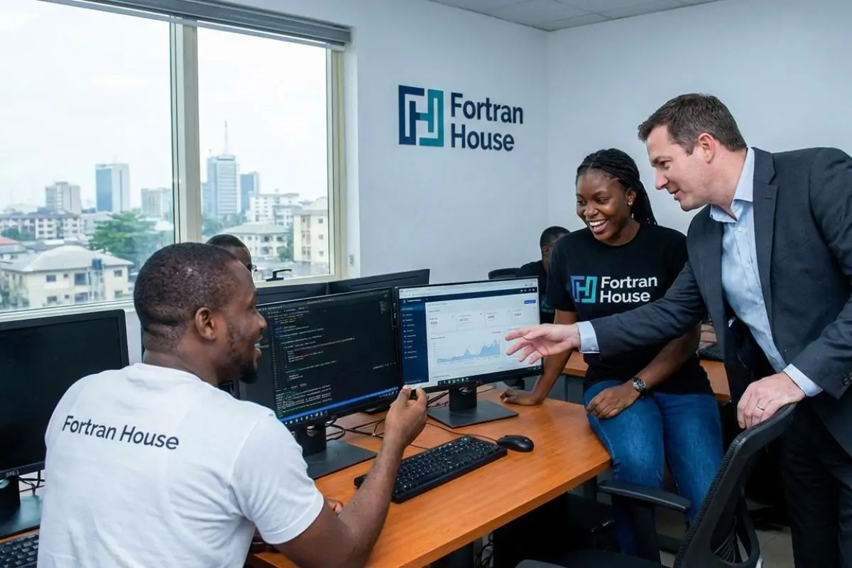 Fortran House building a software for a business in Lagos, in their office